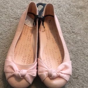 Light Pink Ballet style flat shoes.